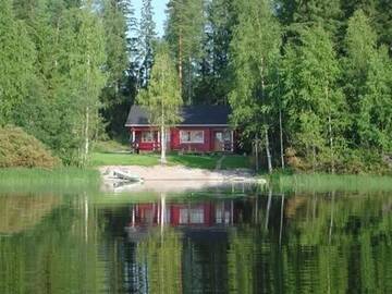 Фото номера Коттедж с 2 спальнями и сауной Дома для отпуска Ylä-Saarikko Holiday Cottages г. Kuusa 44