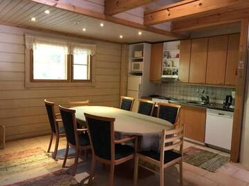 Фото номера Коттедж с 2 спальнями и сауной Дома для отпуска Ylä-Saarikko Holiday Cottages г. Kuusa 55