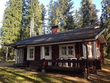 Фото номера Коттедж с 2 спальнями и сауной Дома для отпуска Ylä-Saarikko Holiday Cottages г. Kuusa 31